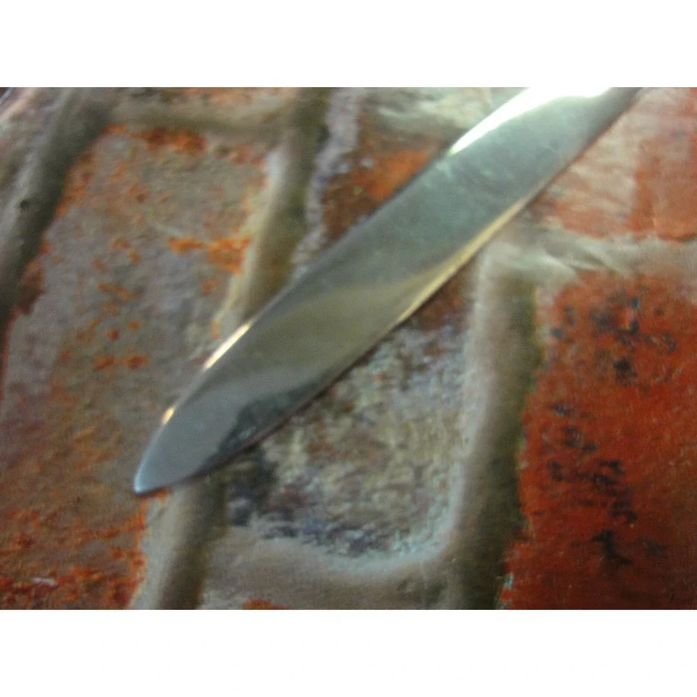 Italy stamped letter opener with CCC and golf clubs symbol estate find